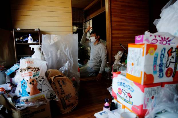 The Wider Image: The man who saves forgotten cats in Fukushima