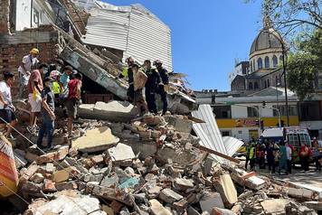 Collapsed buildings in Pereira after earthquake strikes Colombia