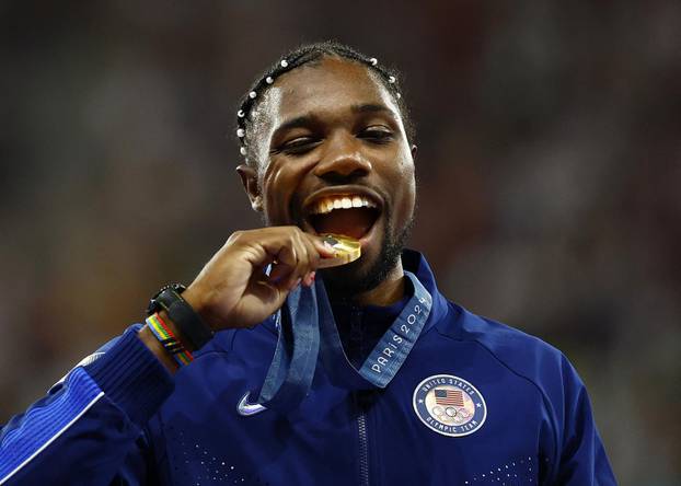 Athletics - Men's 100m Victory Ceremony