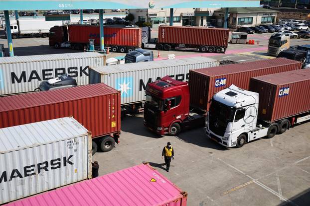 Trucks are parked in front of a gas station to get into the Uiwang ICD Terminal in Uiwang