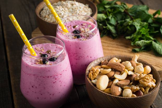 Glasses,Of,Berry,Smoothie,With,Nuts,,Mint,,Blueberry,,Blackberry,,Raspberry,