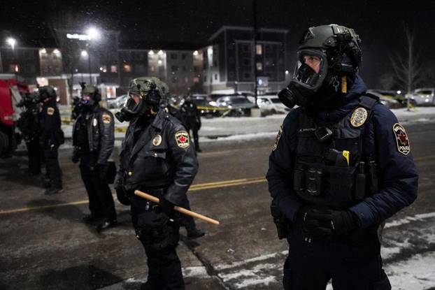 Protest outside the hotel where Bovino, who has been removed from his role, is reportedly staying, in Maple Grove