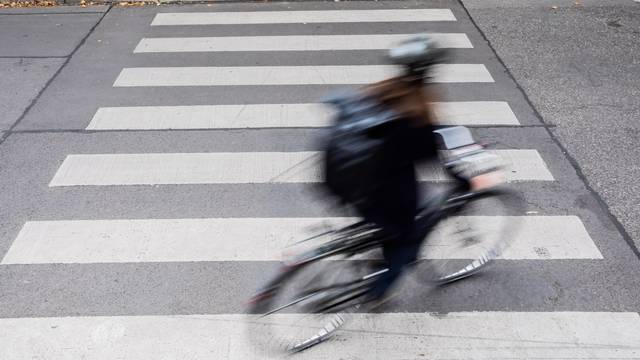 Cyclist on zebra crossing