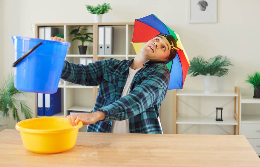 Distressed,Man,Sits,At,Home,With,A,Bucket,,Calling,For