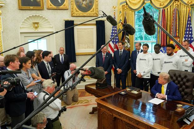 U.S. President Donald Trump meets with players of the Juventus soccer team at the White House in Washington