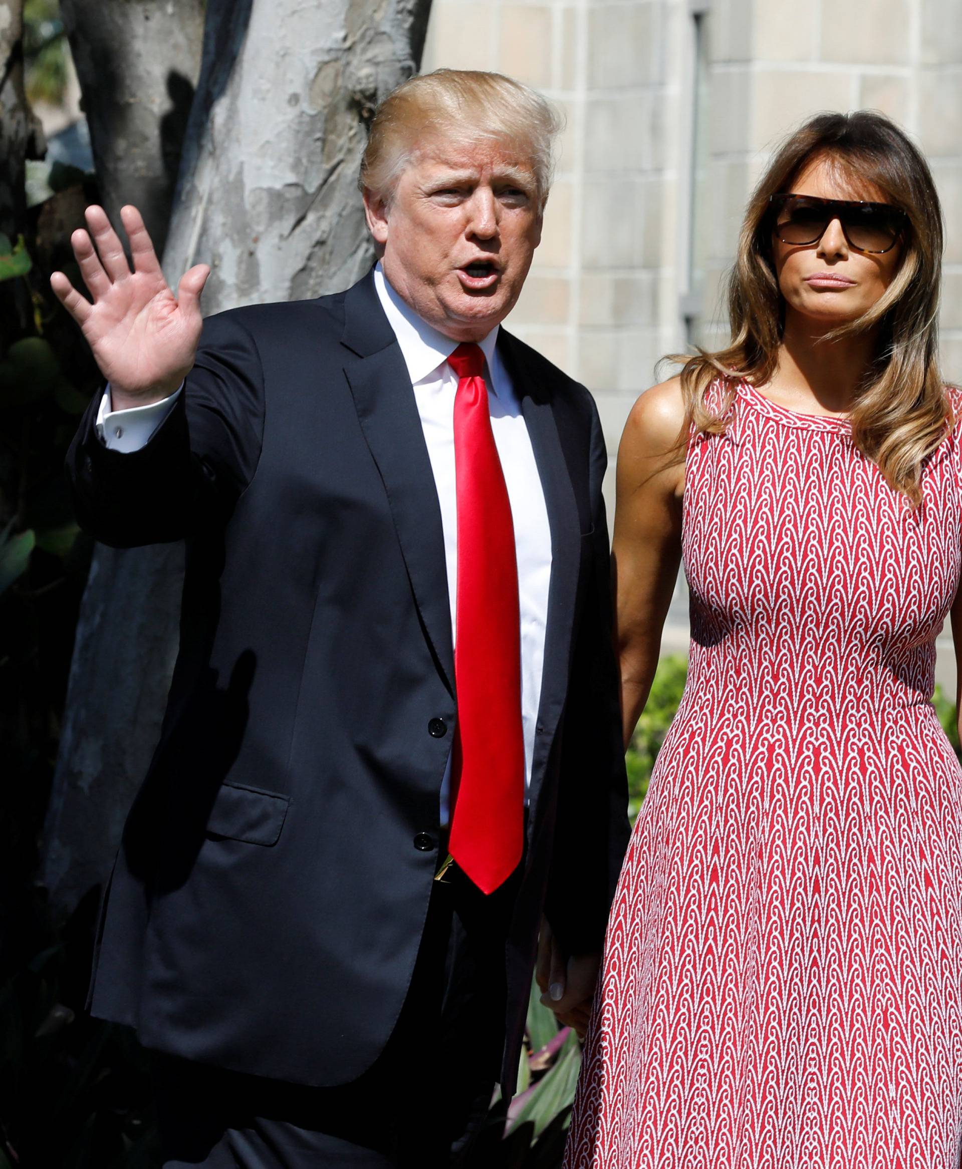 President Donald Trump and first lady Melania Trump arrive for the Easter service at Bethesda-by-the-Sea Episcopal Church in Palm Beach