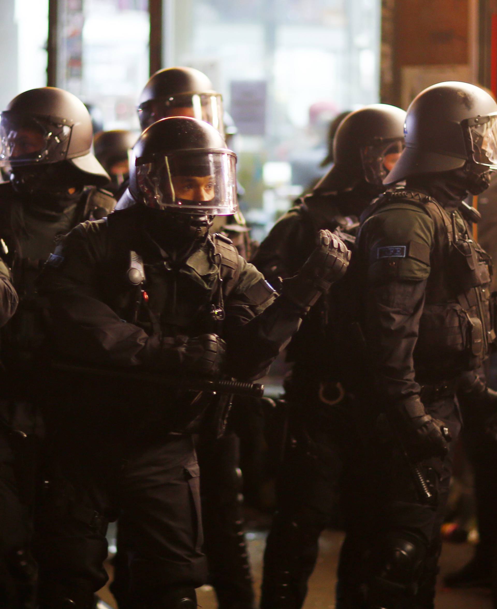 German riot police stand guard during the demonstration at the G20 summit in Hamburg
