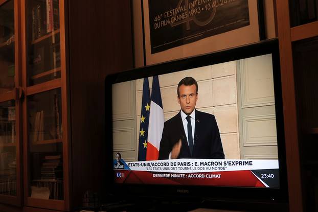 French President Emmanuel Macron, seen on all news channel LCI, speaks from the Elysee Palace in Paris, France, after U.S. President Donald Trump announced his decision that the United States will withdraw from the Paris Climate Agreement