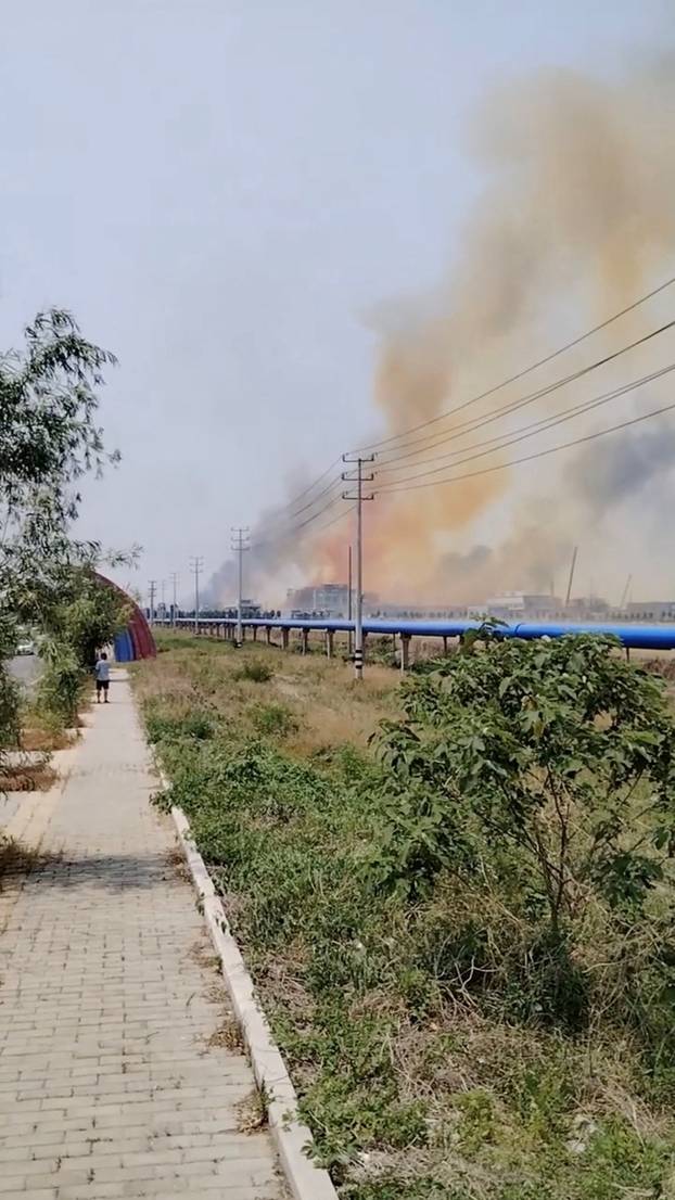 Smoke rises from an explosion in Gaomi