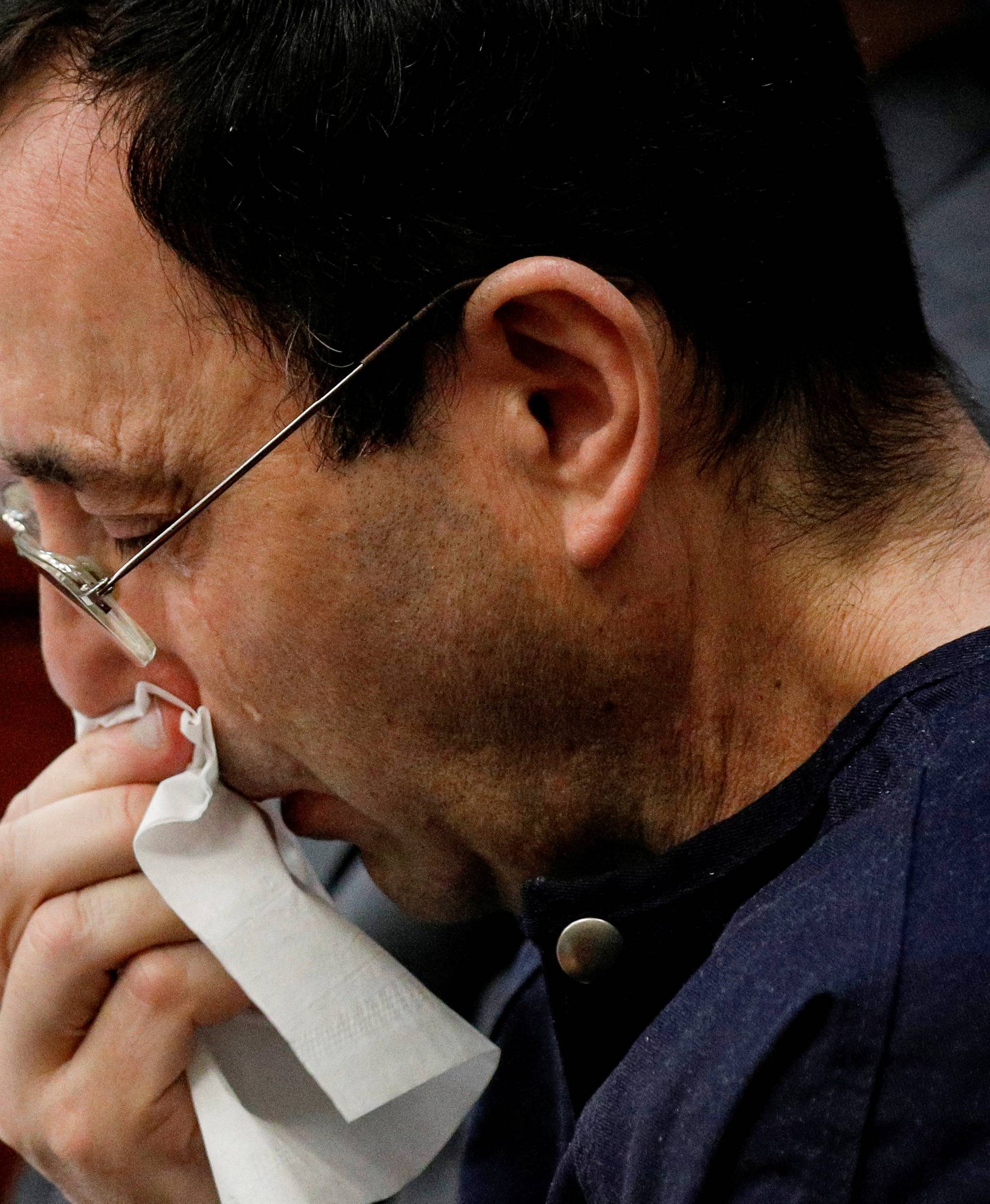 Larry Nassar, a former team USA Gymnastics doctor who pleaded guilty in November 2017 to sexual assault charges, sits in the courtroom during his sentencing hearing in Lansing, Michigan