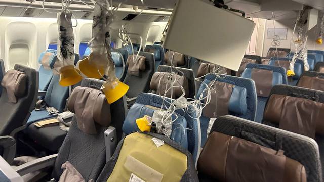 The interior of Singapore Airline flight SQ321 is pictured after an emergency landing at Bangkok's Suvarnabhumi International Airport