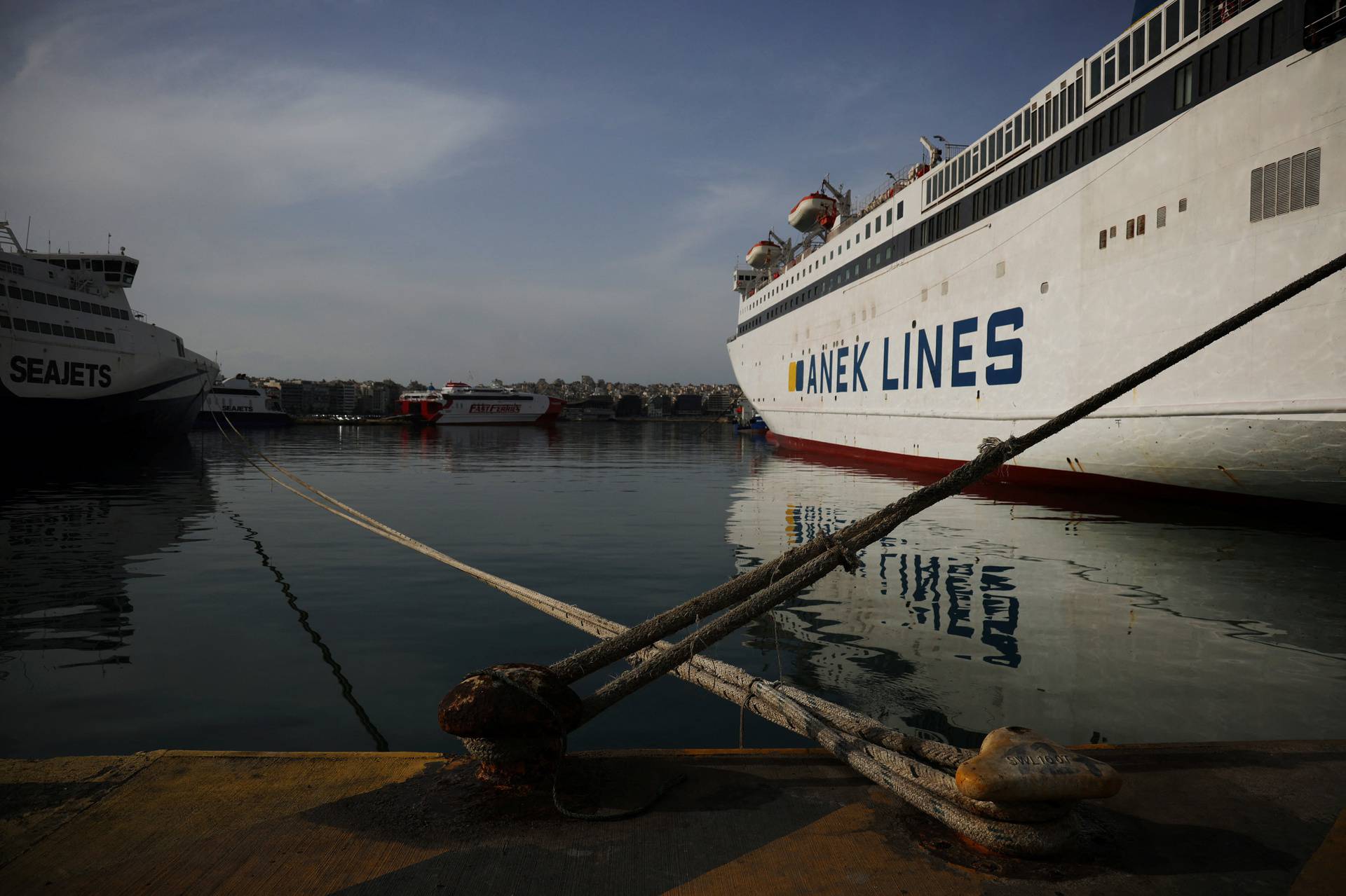 Greek private sector workers hold 24-hour strike to protest low wages, rising living costs