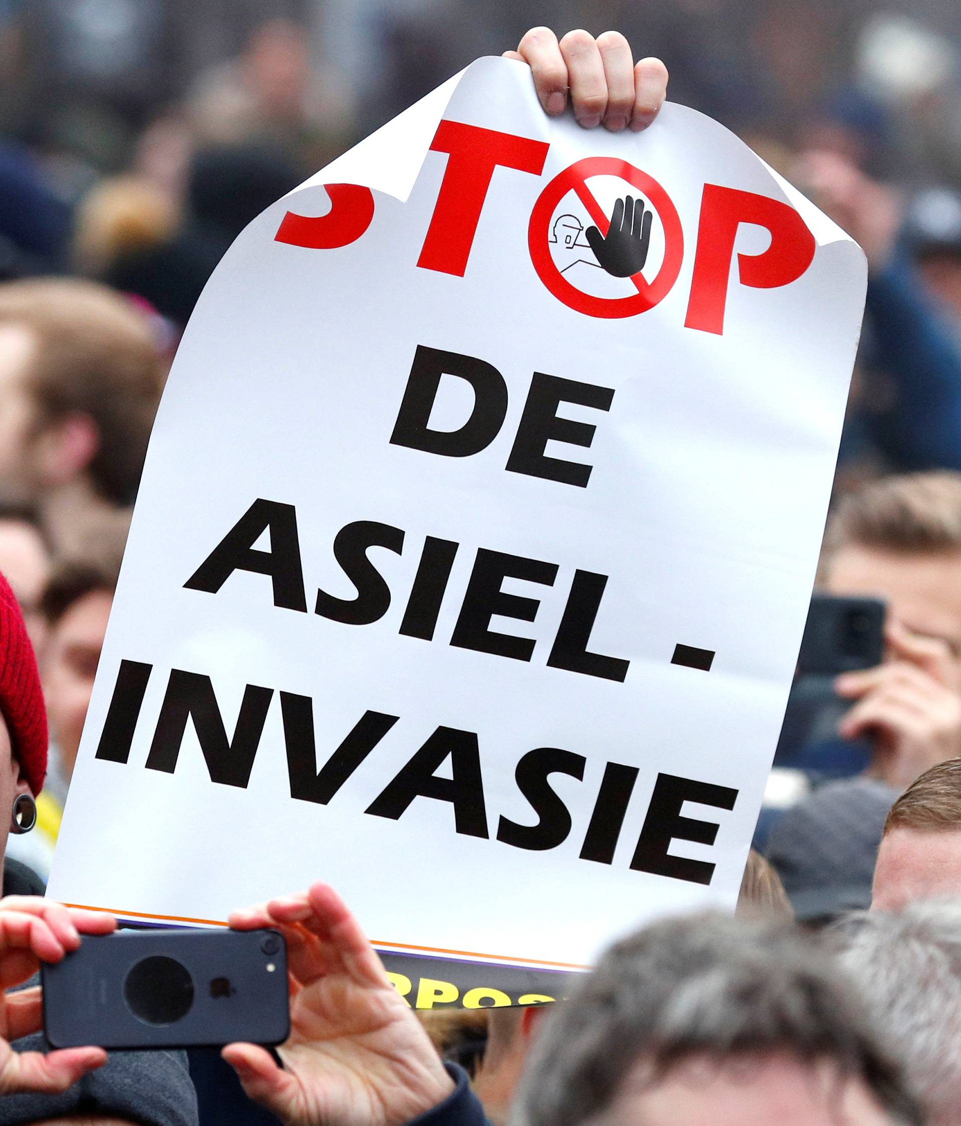 Flemish nationalists attend a protest against Marrakesh Migration Pact in Brussels