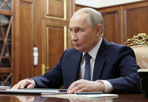 Russia's President Putin meets Minister of Justice Chuychenko in Moscow