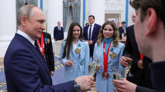 Russian President Putin meets with Olympians in Moscow