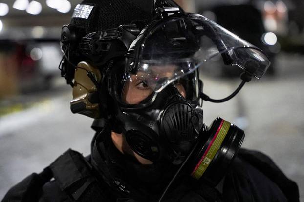 Protest outside the hotel where Bovino, who has been removed from his role, is reportedly staying, in Maple Grove