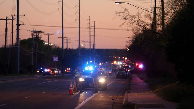 Law enforcement personnel investigate an incident  in Austin