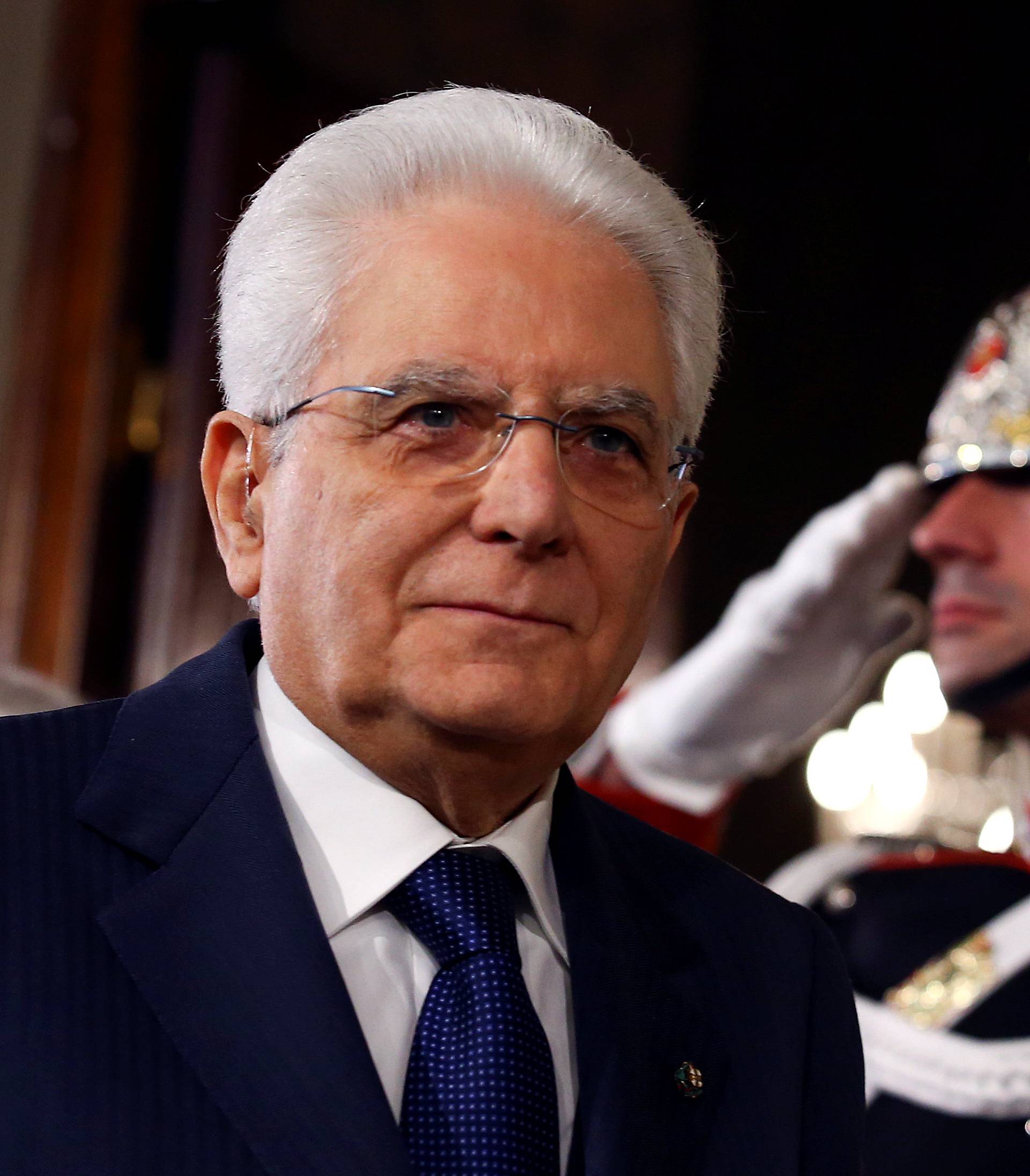 Italian President Sergio Mattarella leaves after speaking to the media during the second day of consultations at the Quirinal Palace in Rome