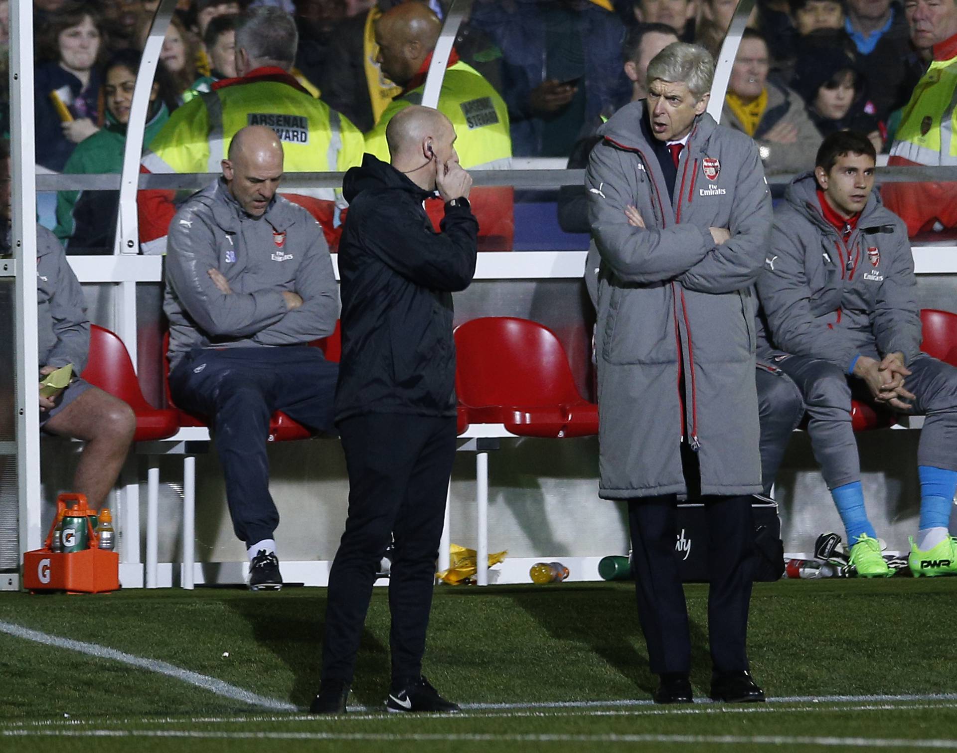 Arsenal manager Arsene Wenger remonstrates with the fourth official
