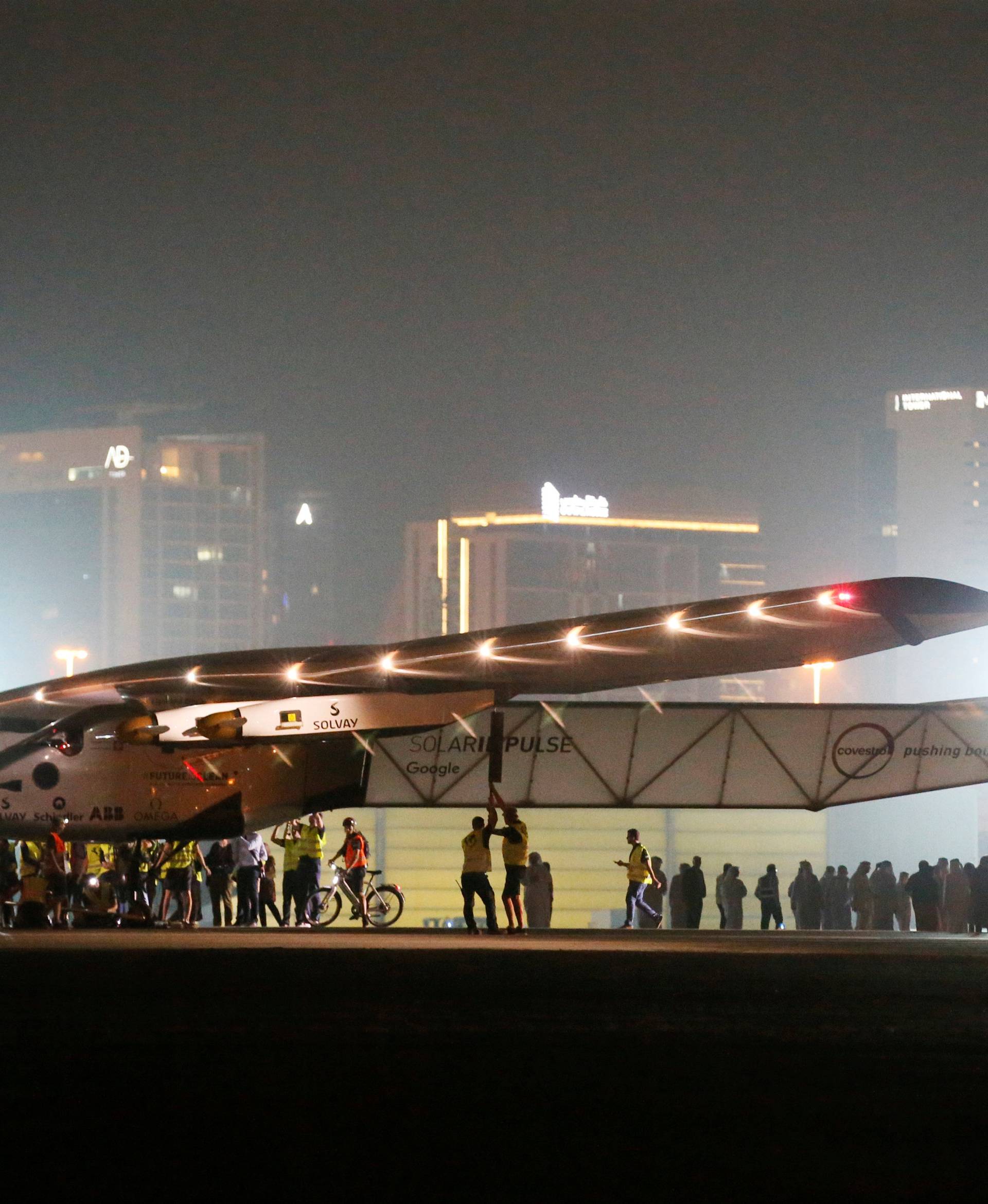 Solar Impulse 2, a solar powered plane, arrives at an airport in Abu Dhabi, UAE