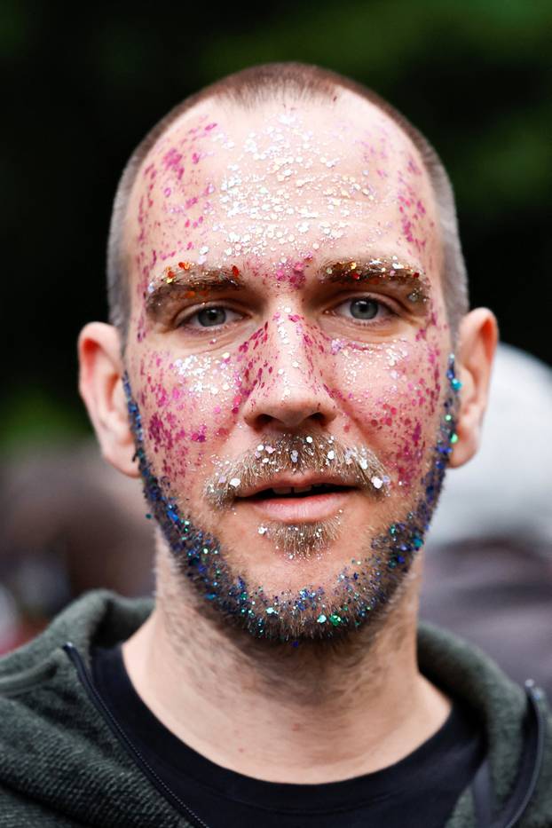 A man poses outside the venue ahead of the Grand Final of the 2026 Eurovision Song Contest in Vienna