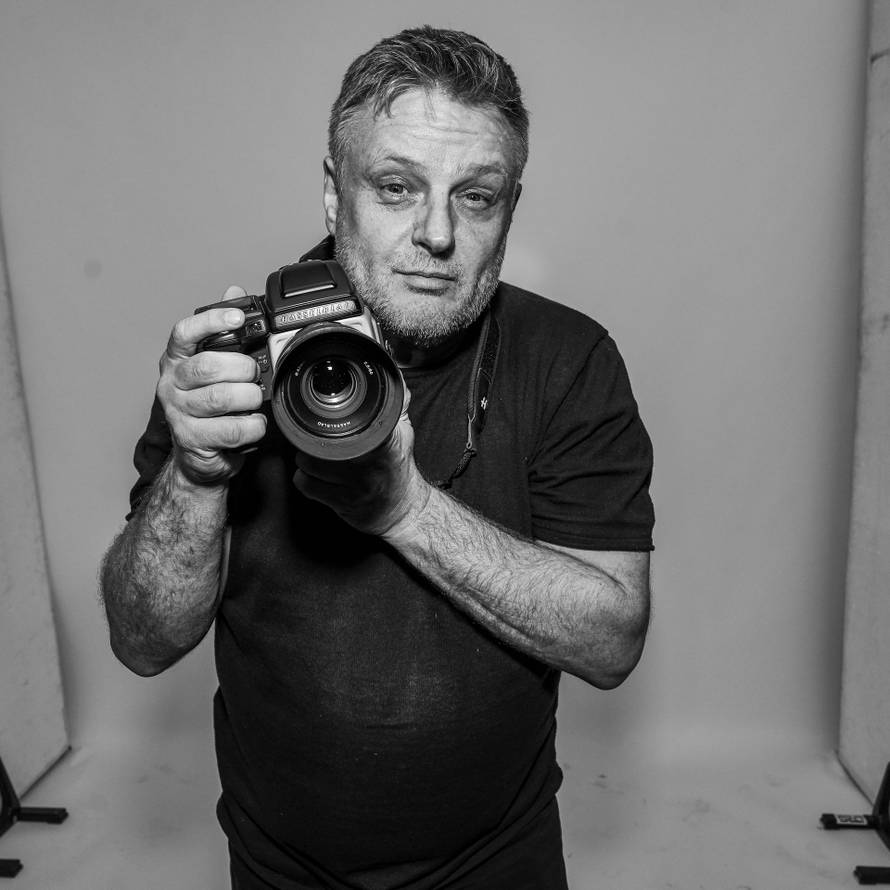 Porterti fotografa Johna Rankina