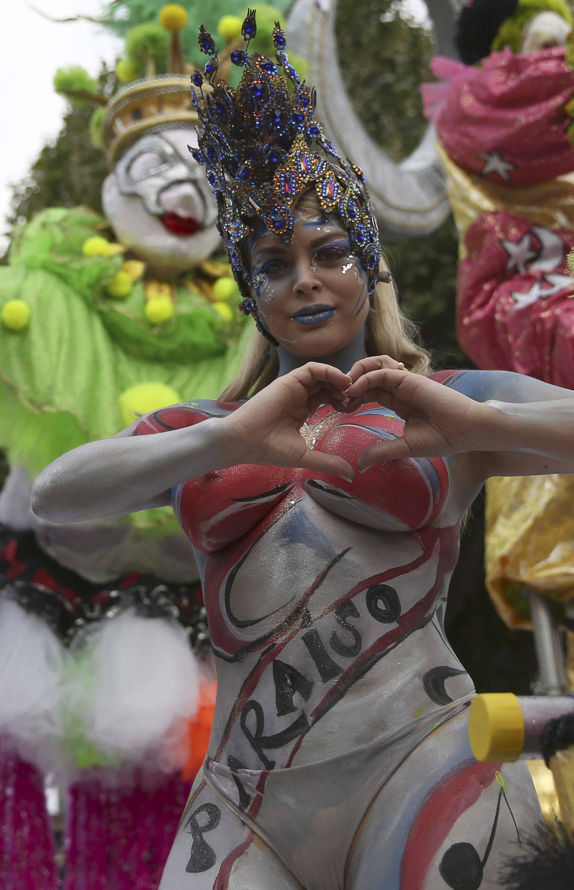 A performer participates in the parade at the Notting Hill Carnival in London