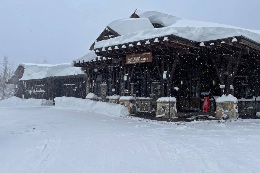 Rescue teams deploy to the site of an avalanche in a backcountry slope of California's Sierra Nevada mountains