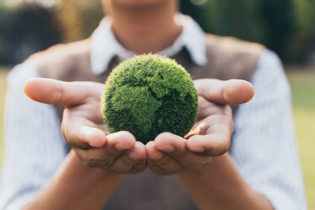 Asian,Teenager,Showing,Earth,On,Hand,,Ecology,And,Environment,Sustainable