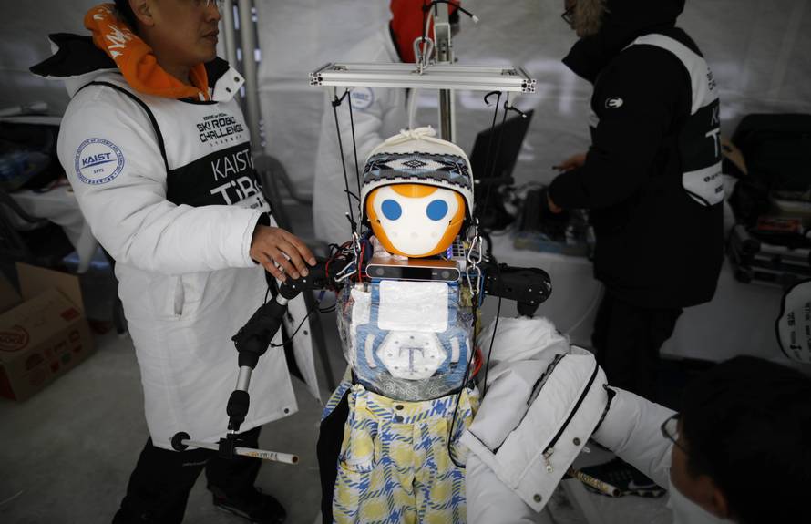 A robot takes part in the Ski Robot Challenge at a ski resort in Hoenseong,