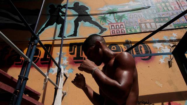 A boxing student practices during a training session in Havana