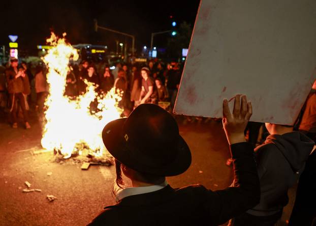Israelis protest a ceasefire deal, in Jerusalem