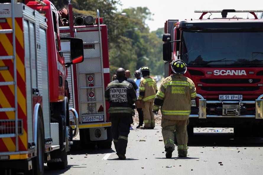 Emergency services work at the scene where a gas tanker exploded in Boksburg near Johannesburg
