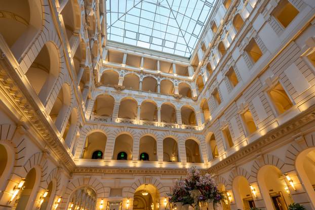 Budapest, Hungary - Feb 09, 2020: Atrium view inside New York Cafe with lights on
