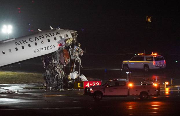 Air Canada Express jet collides with a ground vehicle at LaGuardia airport
