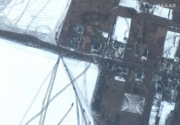 A satellite image shows armoured vehicles moving northeast of Antonov Airport near Hostomel