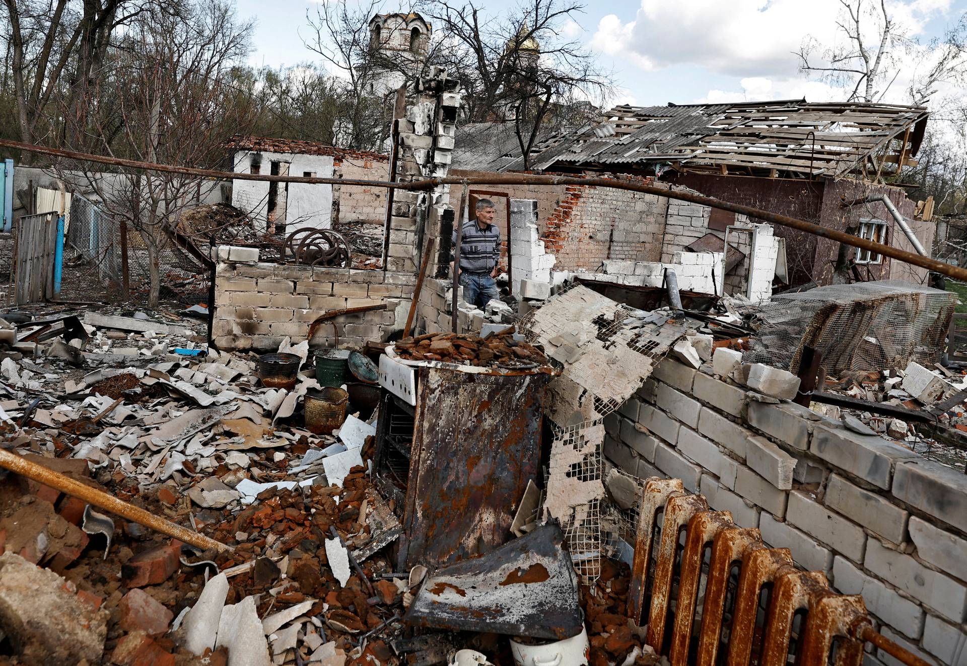 Destroyed house of killed resident amid Russia's invasion of Ukraine in Lukashivka