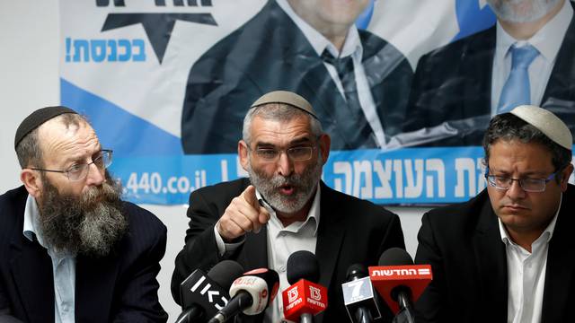 Michael Ben-Ari from the Jewish Power party delivers a statement to the media together with his party's members, Baruch Marzel and Itamar Ben-Gvir in Jerusalem