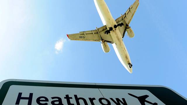 FILE PHOTO: An aircraft comes in to land at Heathrow Airport in west London