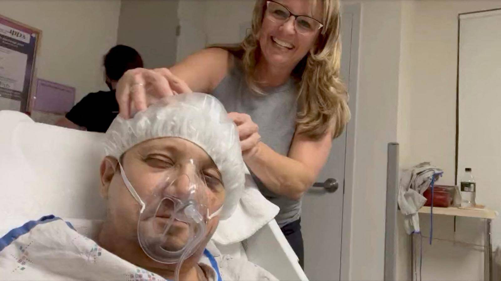 Actor Jeremy Renner gets his head massaged during hospital stay following an accident