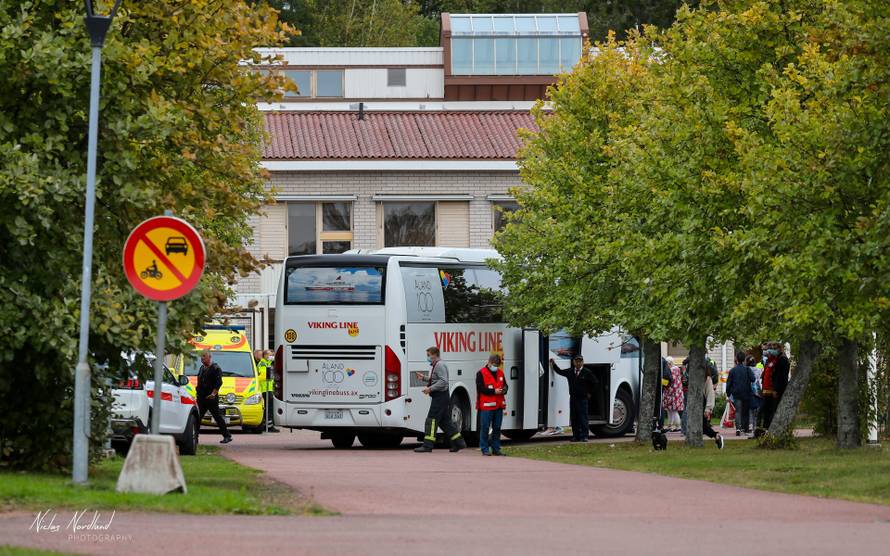People evacuated from Viking Line's cruiseferry MS Amorella are seen in Svino