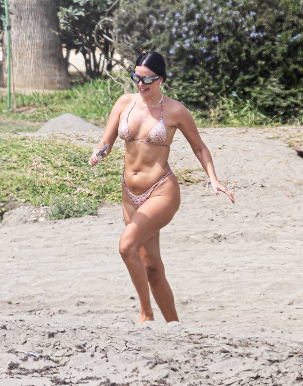 EXCLUSIVE: World Cup's Sexiest Fan Ivana Knoll Enjoys A Day At The Beach In Marbella