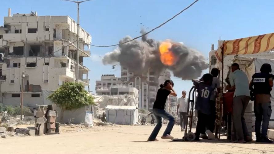 Israeli strike hits residential multi-storey building in Gaza City