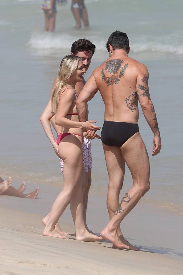 *PREMIUM-EXCLUSIVE* Hunter Biden's Wife Melissa Cohen looks fit and fabulous in a tiny red bikini as she relaxes in Rio de Janeiro!