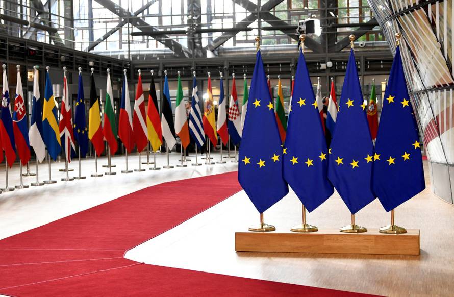 FILE PHOTO: Flags of EU and member states placed for a 2019 summit in Brussels
