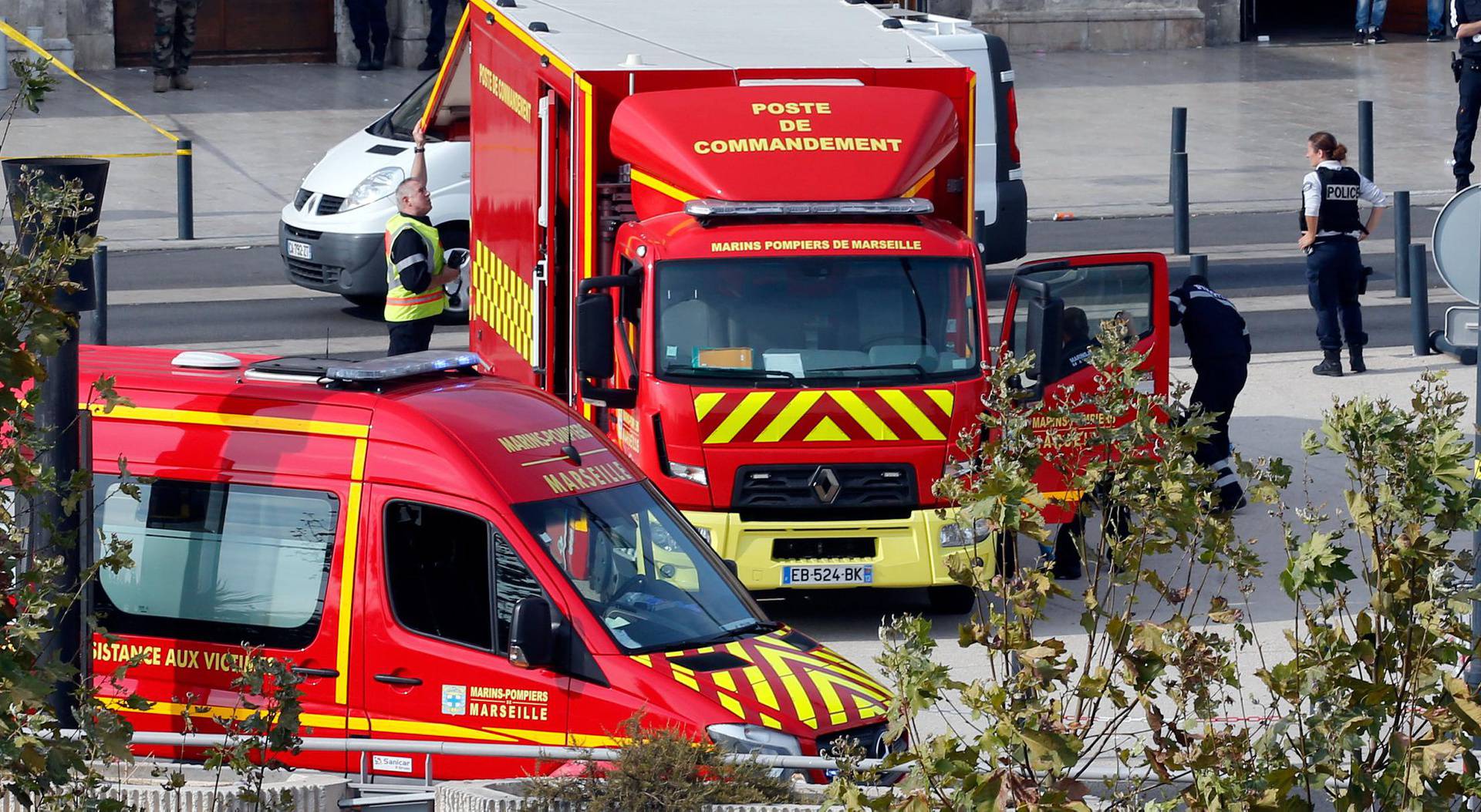 Emergency services vehicles are seen outside the Saint-Charles train station after French soldiers shot and killed a man who stabbed two women to death at the main train station in Marseille