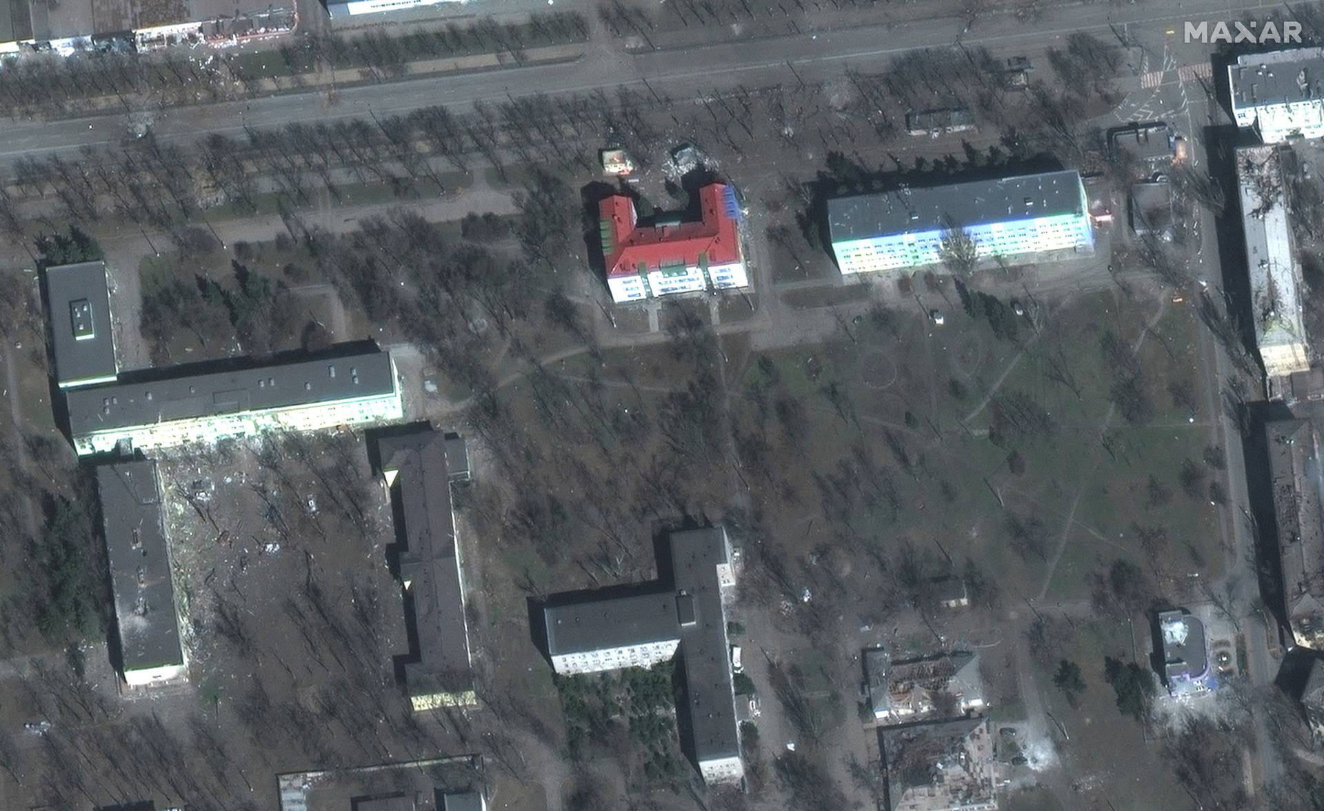 A satellite image shows damaged hospital buildings in Mariupol