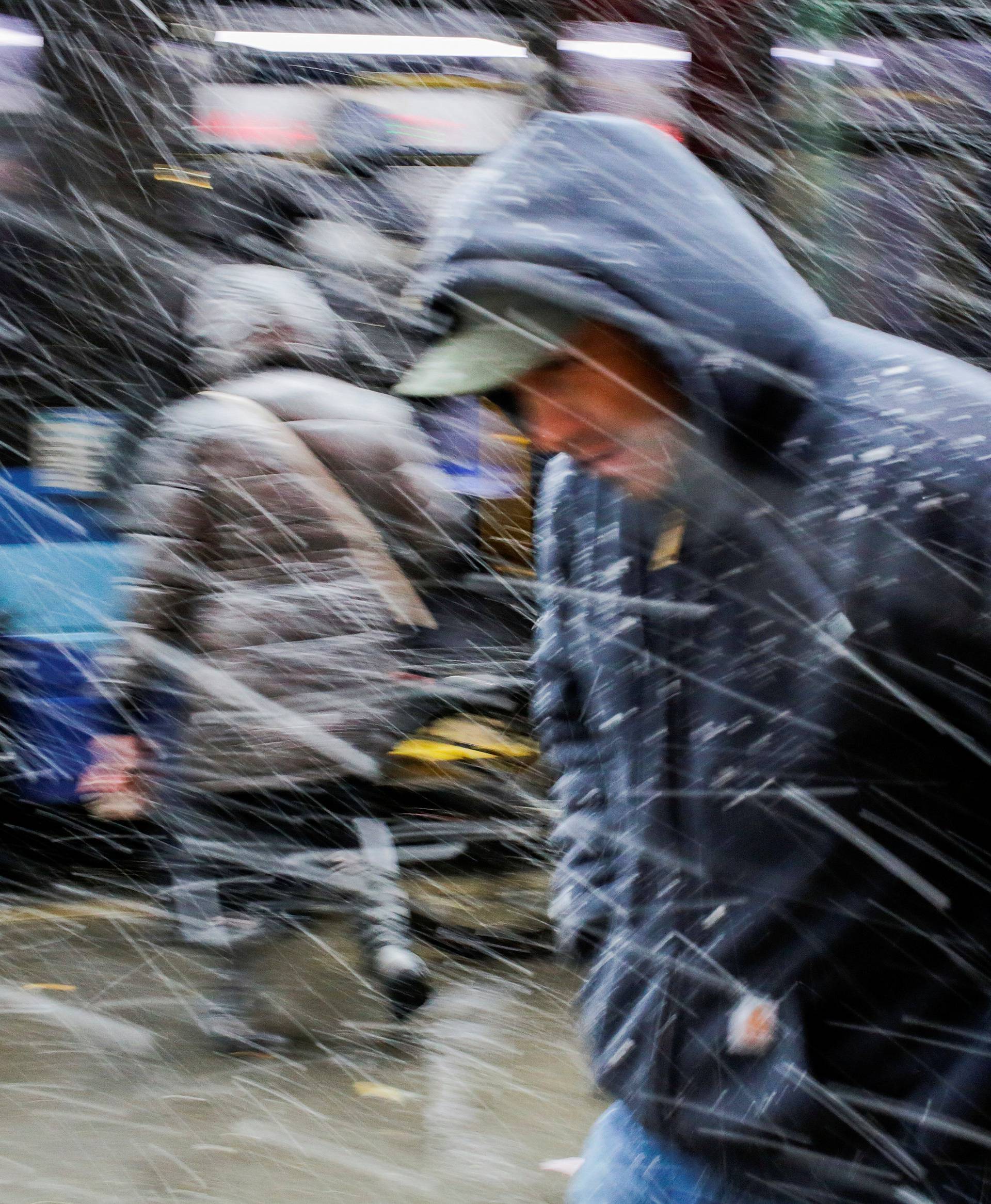 A man walks during a snowstorm in New York City, New York