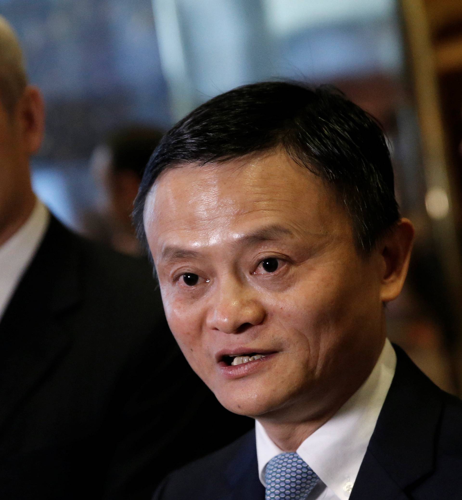 Alibaba executive chairman Jack Ma speaks to reporters after meeting with U.S. President-elect Donald Trump at Trump Tower in New York