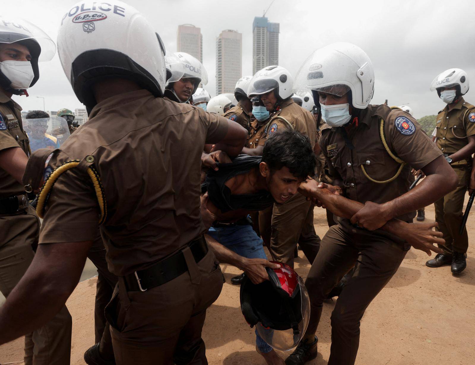 Sri Lanka's ruling party supporters storm anti-government protest camp, at least 9 injured, in Colombo